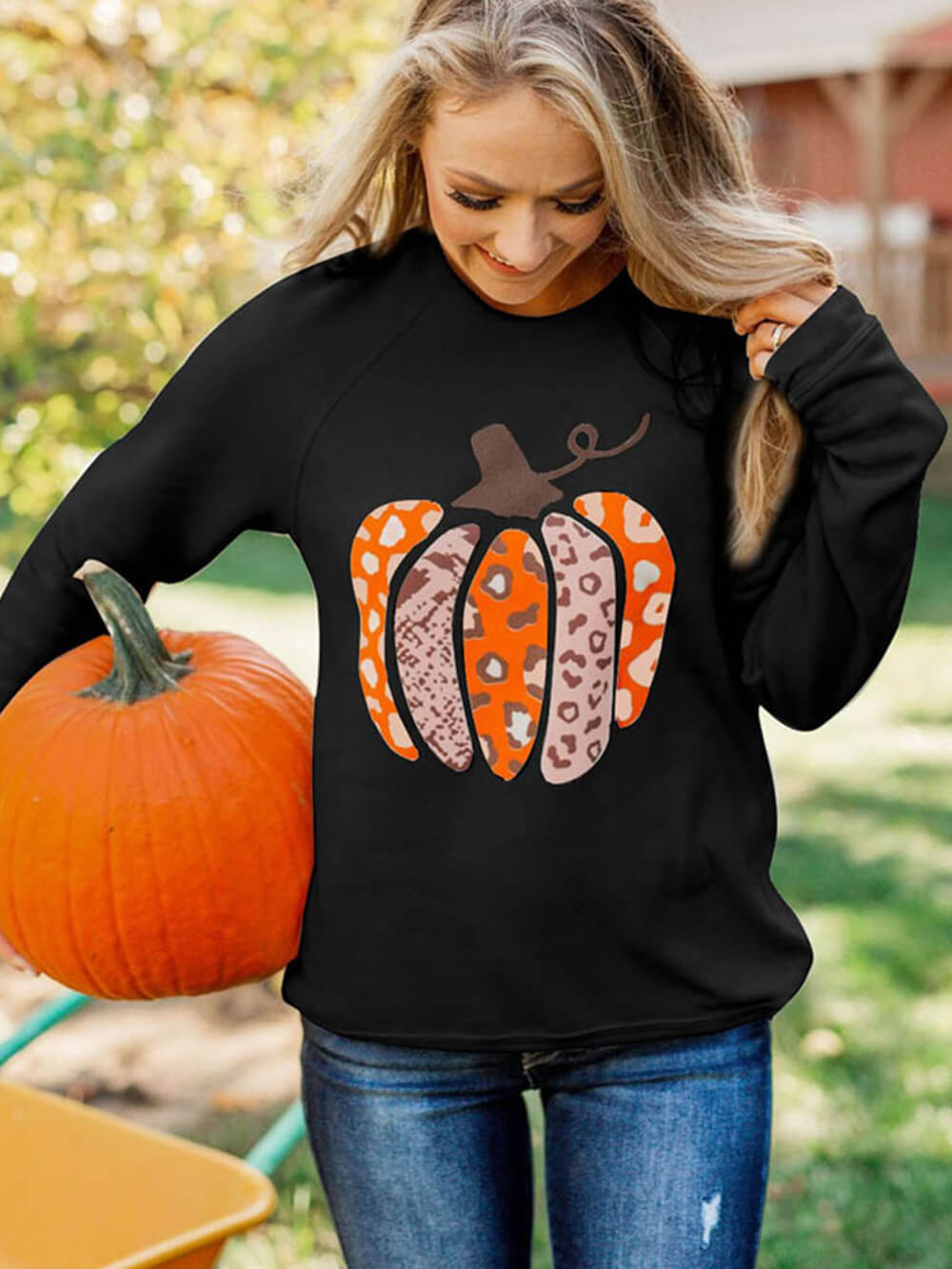 Women's pumpkin print graphic pullover — full length