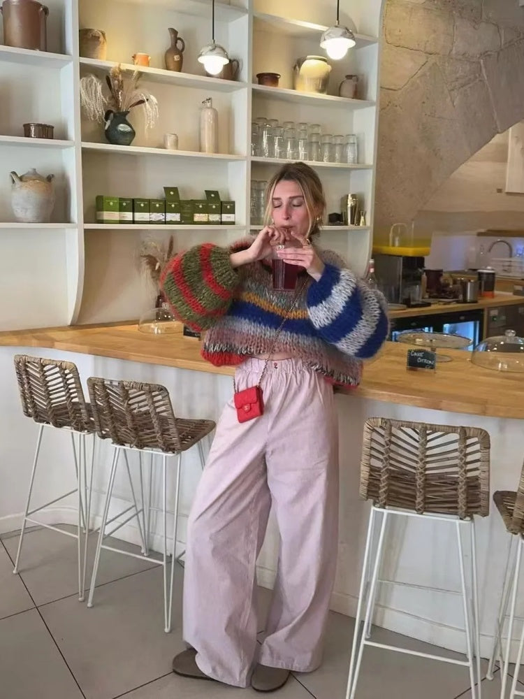 Women's rainbow stripe knit sweater with relaxed fit