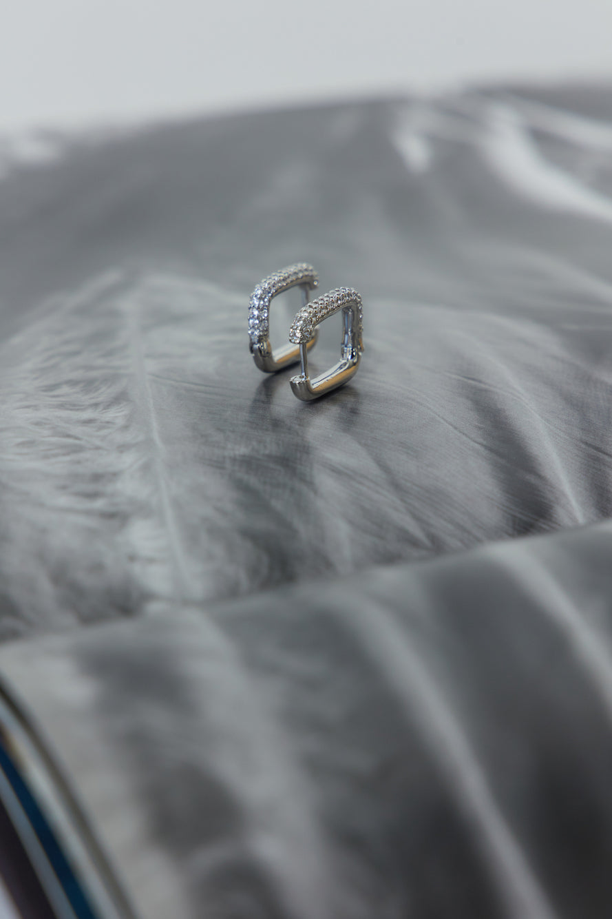 Women's silver diamante rectangle earrings — detail view
