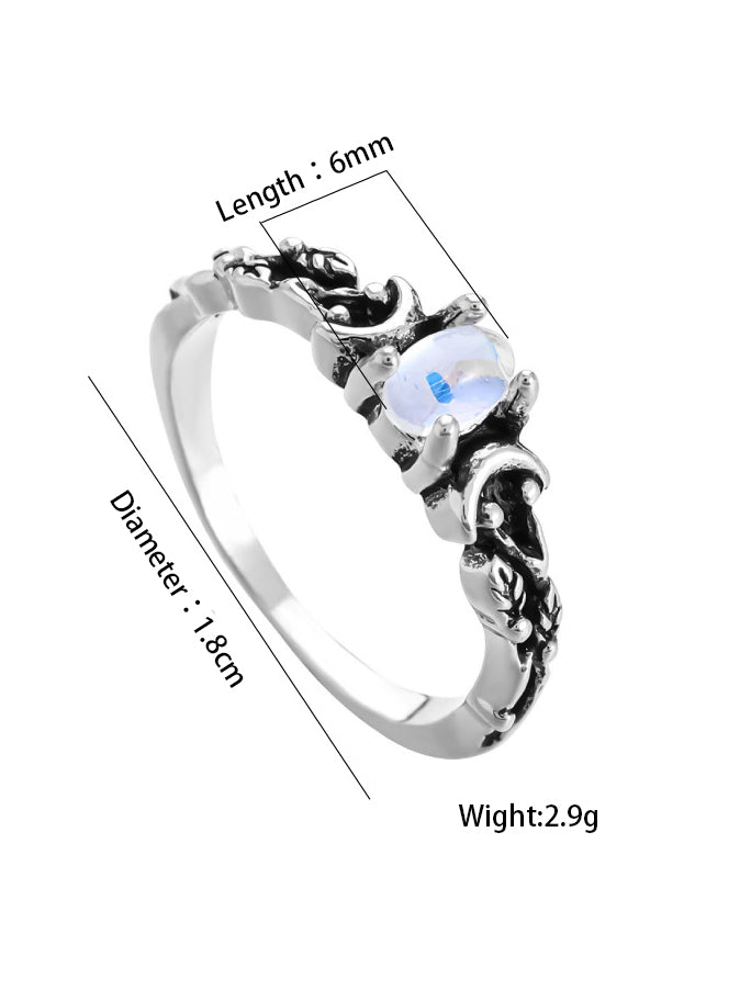 Women's silver triple moon phase ring — close-up detail