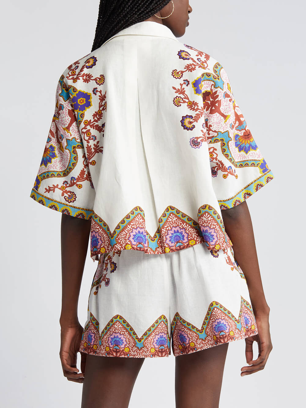 Women's white floral print shirt and shorts co-ord set — back view