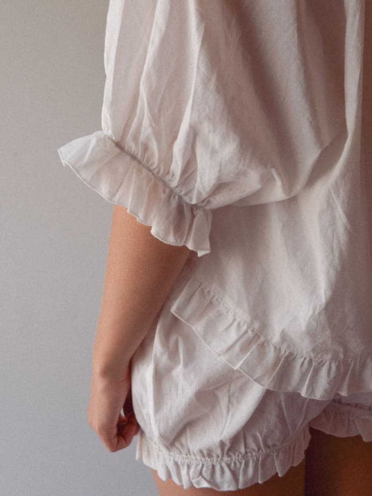 Women's white ruffle pyjama set — fabric detail